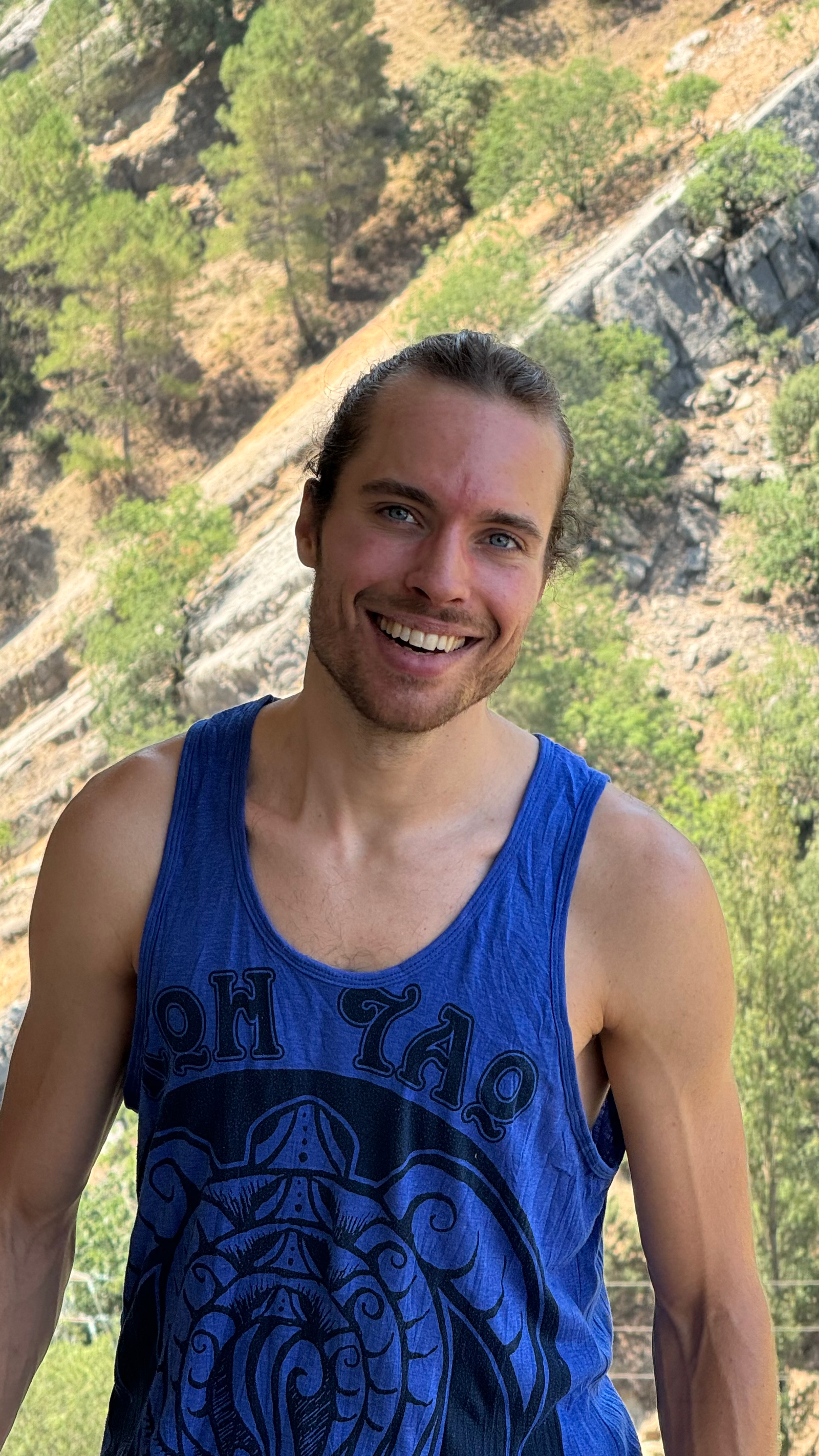 A candid portrait of Filip Krzyzanowski outdoors